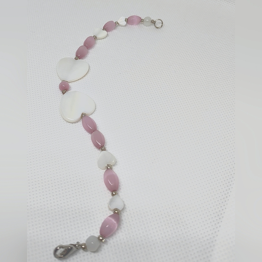 Heart bracelet and 4 strand bracelet 7" each pink and white